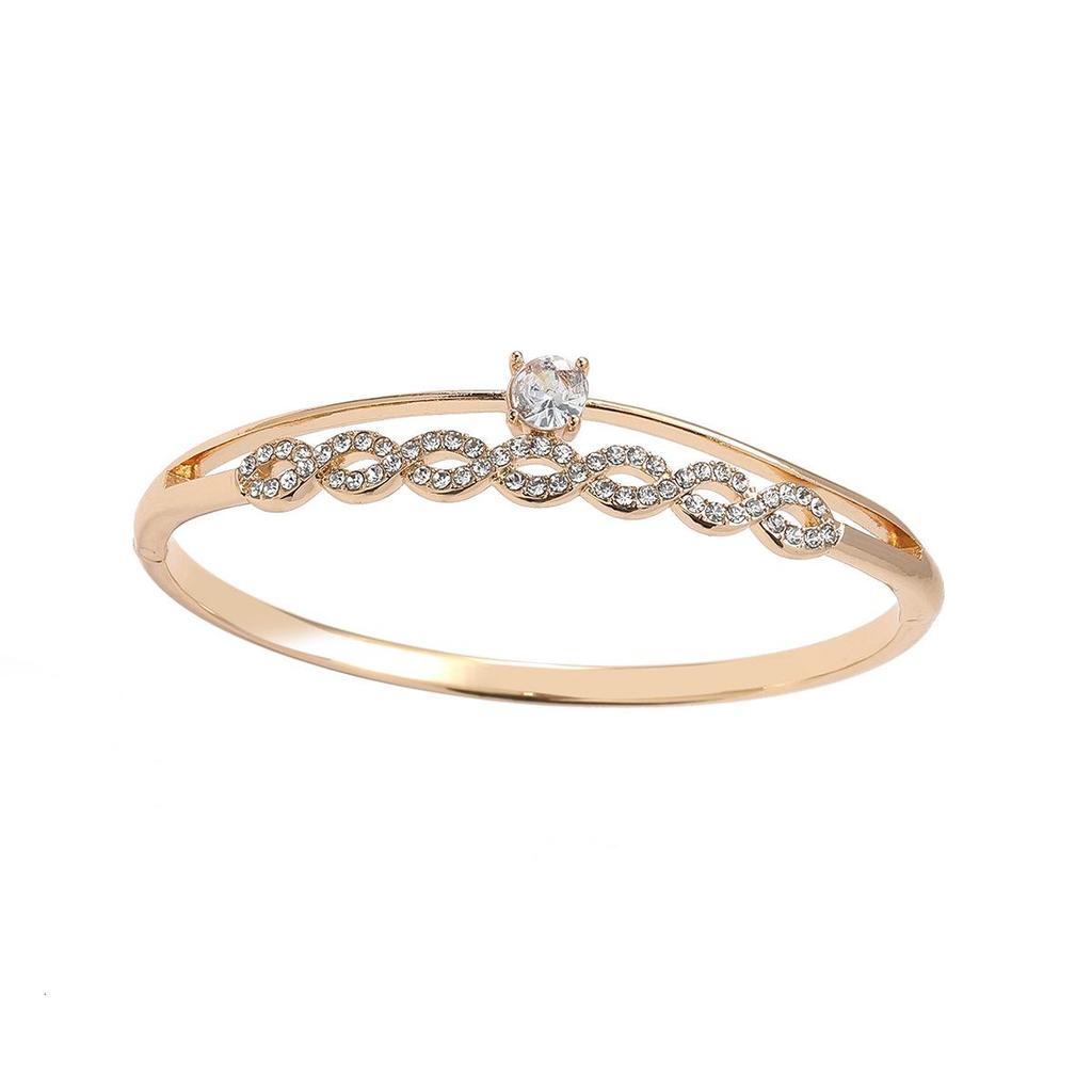 Bracciale Cerchio Intarsiato con Diamanti a Forma di 8 Incrociato - Gioiello Versatile, Creativo ed Elegante