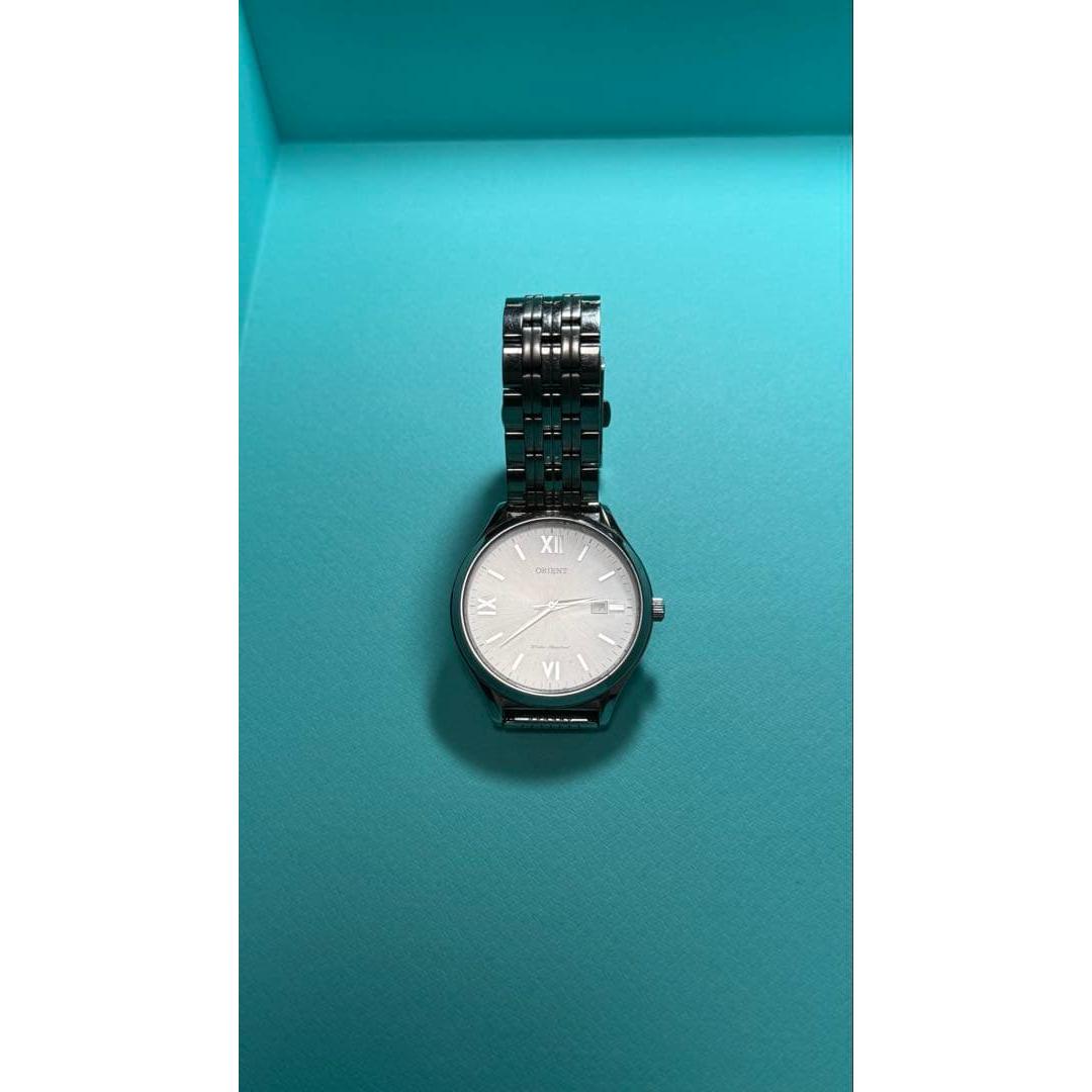 Used ORIENT quartz watch silver dial