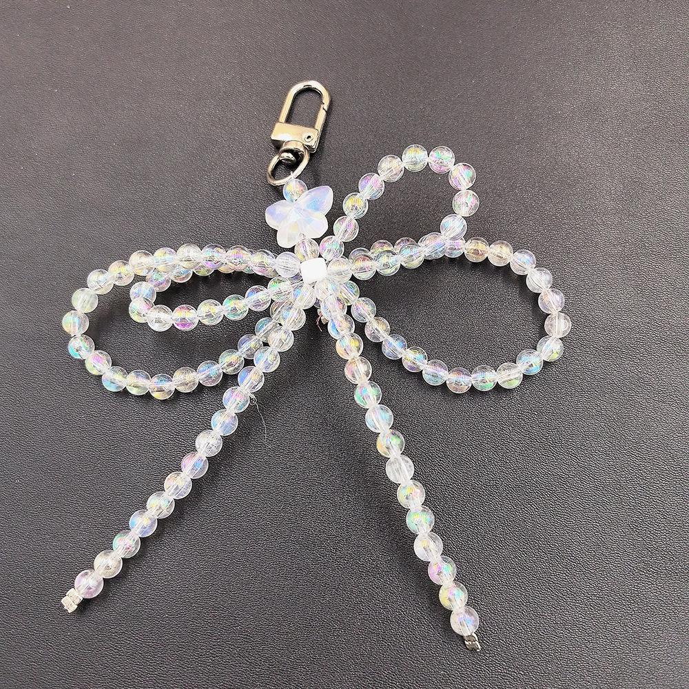 

Однотонная сумка для телефона с пряжкой в виде сердца и кулоном из бисера и цепочки прозрачный