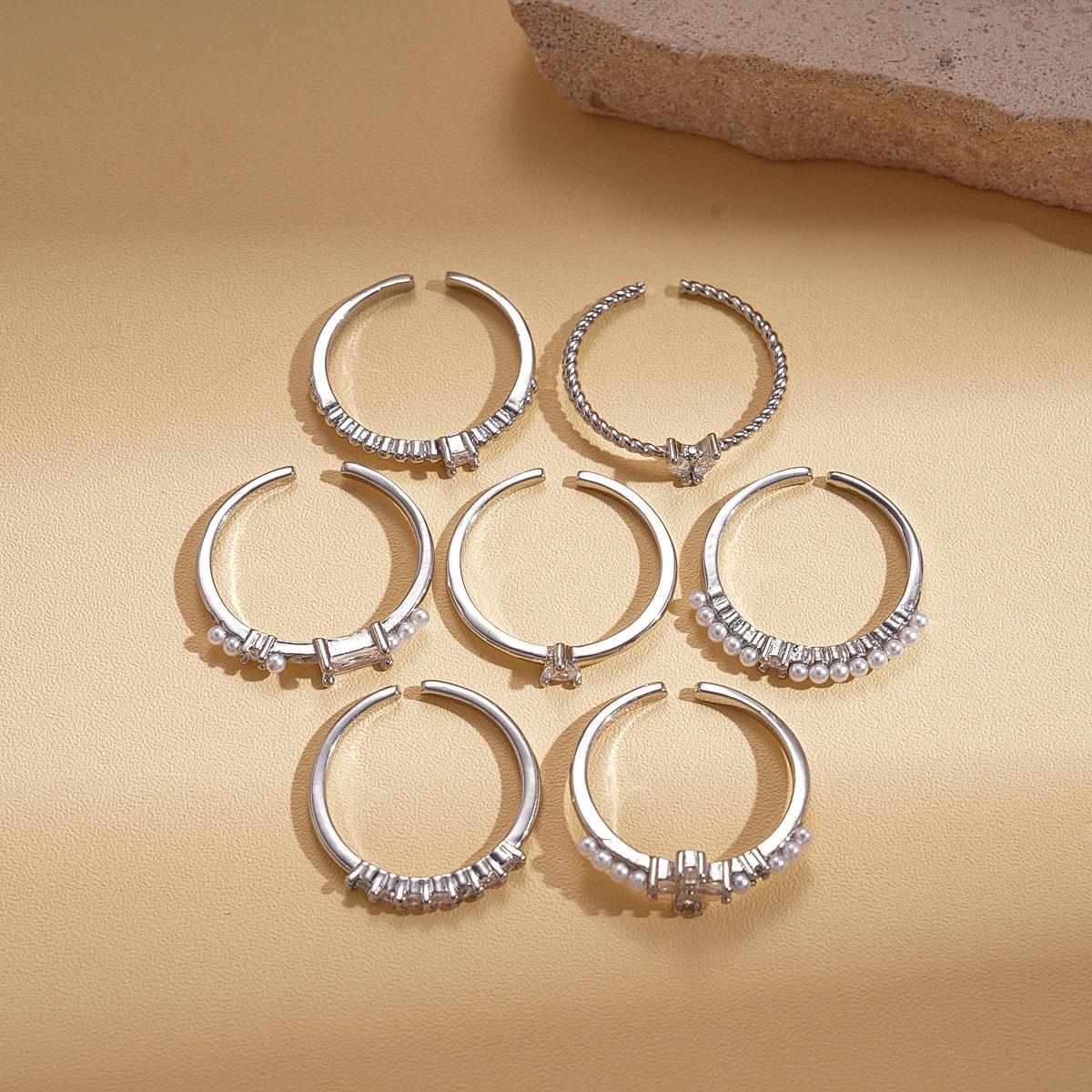 

Seven-piece set of zircon imitation pearl geometric opening ring versatile commuter light luxury jewelry