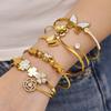 18K Gold Plated Stainless Steel Bracelet with Inlaid Zirconia Butterfly and Flower Design