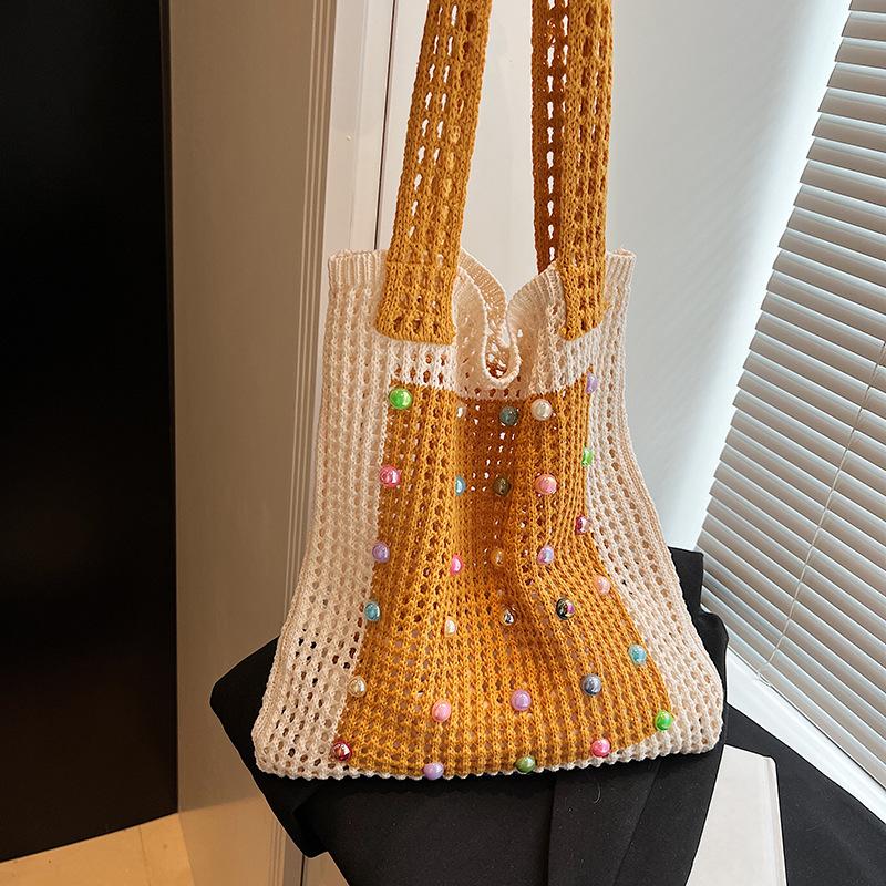 Large Capacity Hollow Knitted Bag Women's New Spring and Summer Lazy Wind Shoulder Bag Seaside Vacation Water Beach
