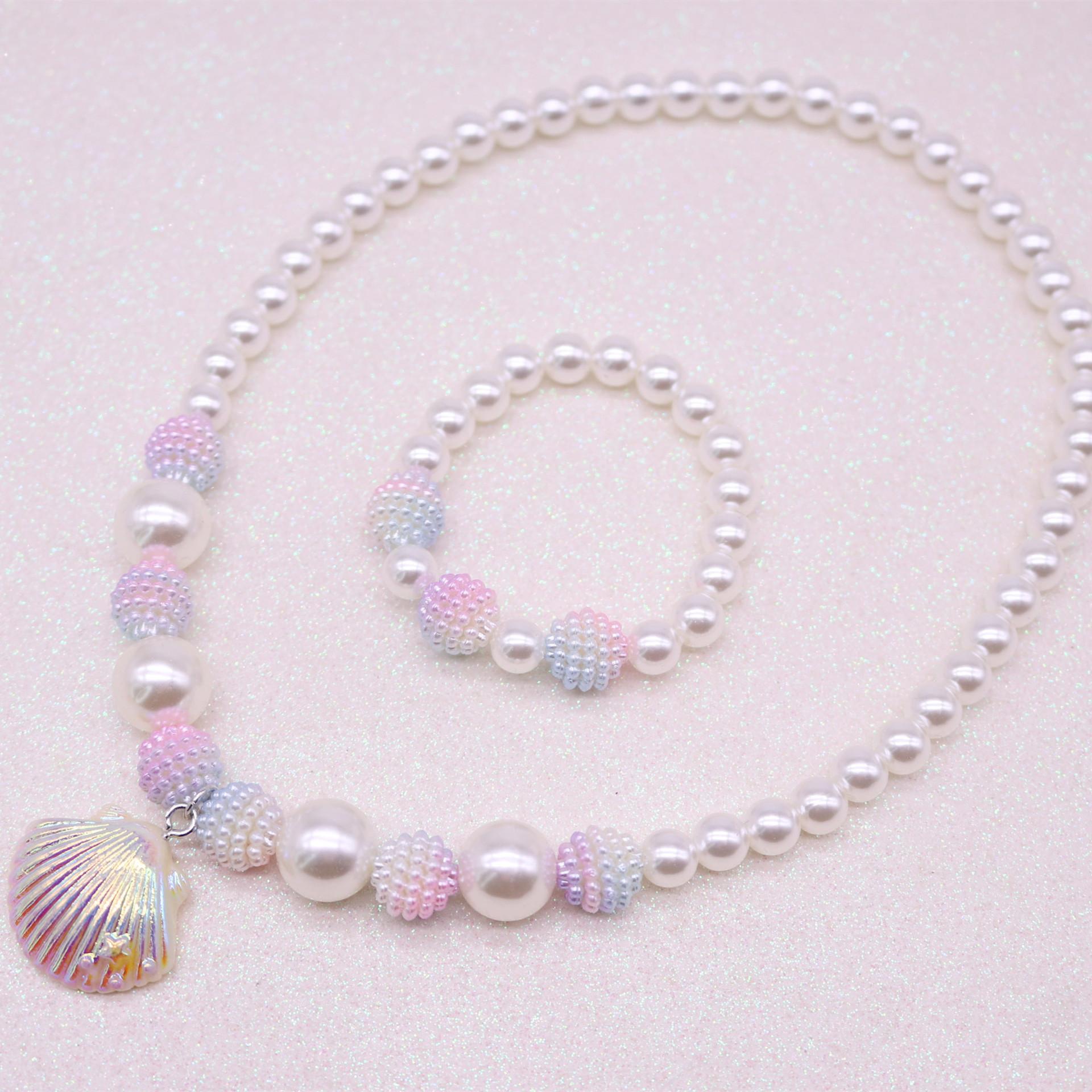 

2 шт. Детский комплект ожерелья и браслета с ракушками, ожерелье из бисера в виде русалки, детский комплект украшений для девочек, подарок на день рождения, реквизит для фотосессии фиолетовый