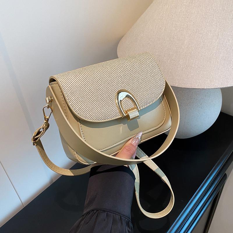 Retro niche underarm bag women's new trendy fashion saddle bag simple and versatile shoulder messenger bag