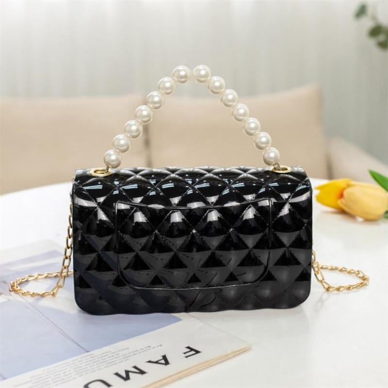 Modische Silikon-Handytasche Jelly Pearl Handtasche Stilvolle Kette Umhängetasche Geeignet für Frauen Täglich, Arbeit, Outdoor, Reisen.