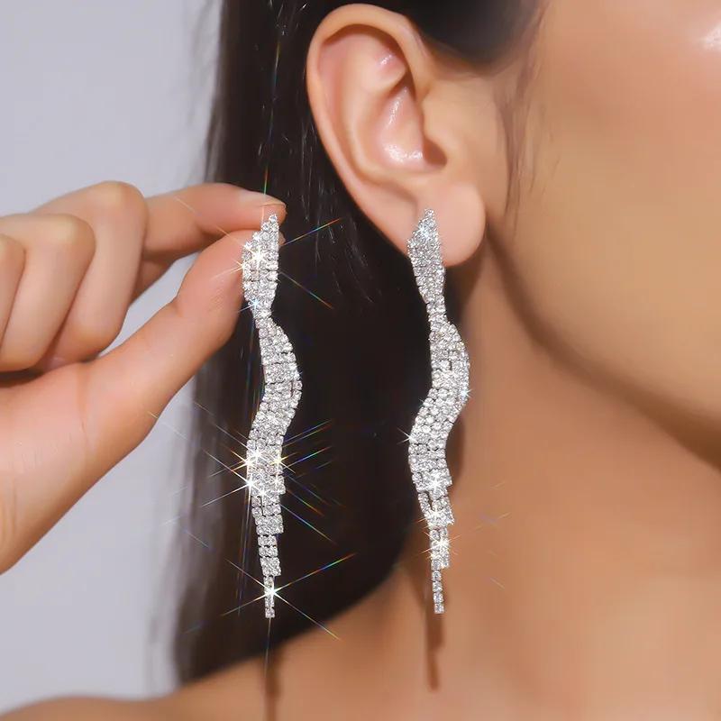 

Модные длинные серьги-кисточки с кристаллами для женщин, медного цвета, со стразами, висячие серьги, циркон для свадьбы