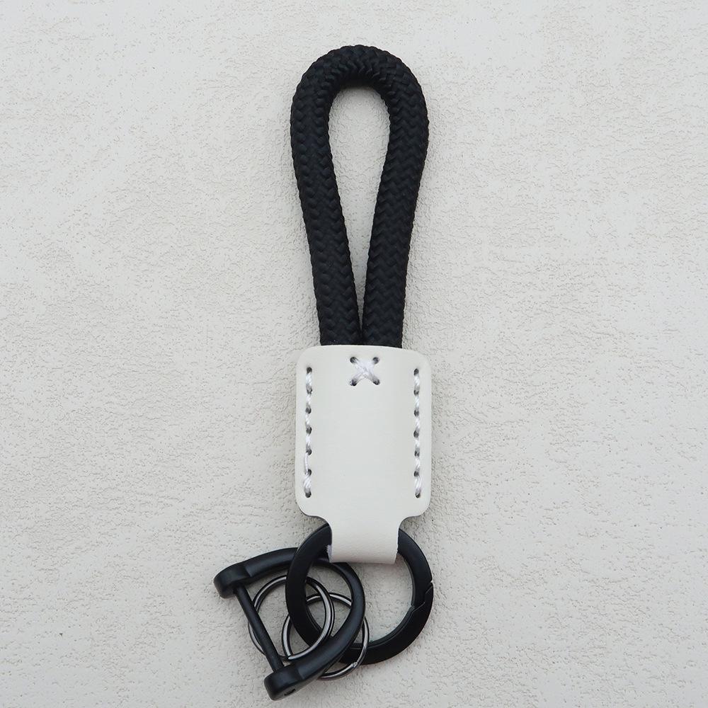 Hand-Woven Cowhide Leather Keychain Pendant with Logo Embossing - High-Quality Anti-Lost Car Lanyard