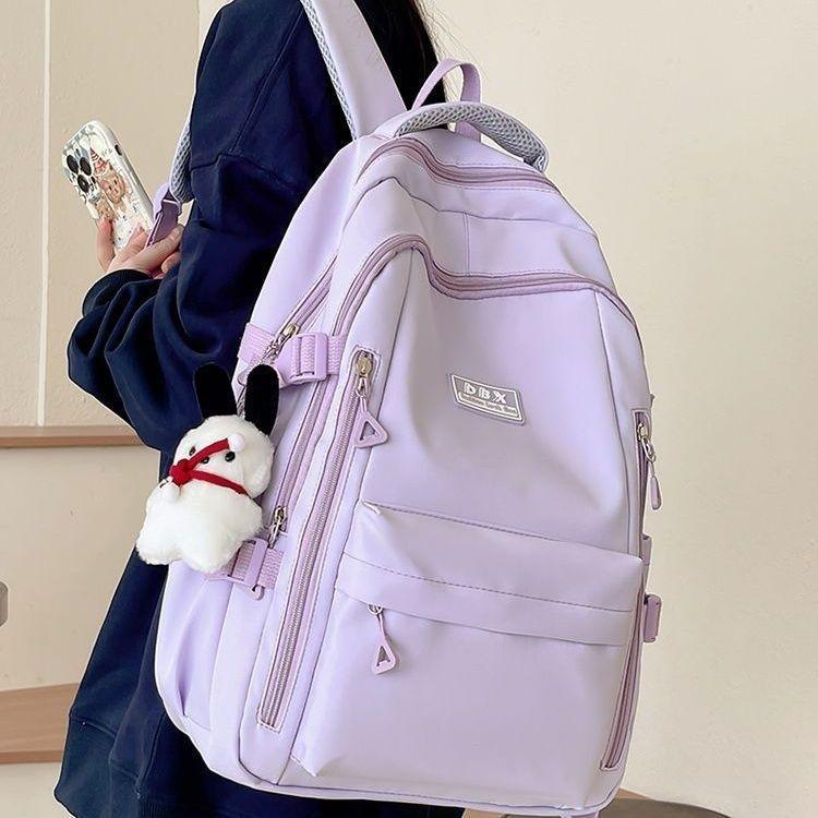 

Backpack travel college student large capacity backpack new junior high school ins schoolbag Japanese high school students single bag фиолетовый