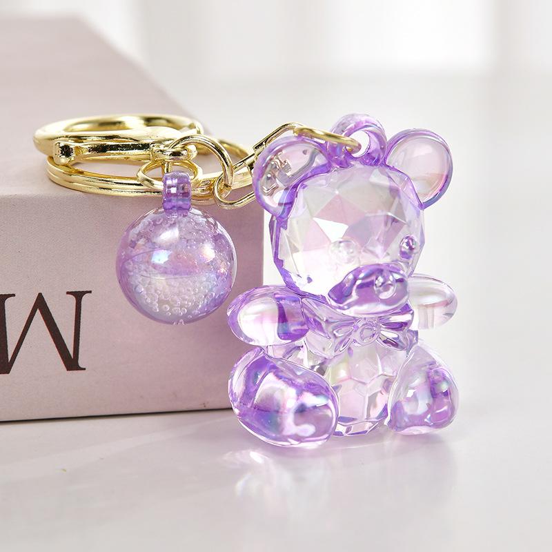 

Переливающийся брелок «Маленький мишка» с галстуком-бабочкой - Акриловый шарм для сумки, Блайнд-бокс Light Gold Buckle + Transparent Bear + Beads фиолетовый