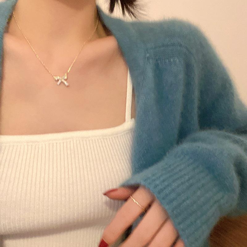 Collier nœud femme design de niche de luxe léger chaîne de clavicule sens 2023 nouvelle chaîne de cou tendance ins tempérament