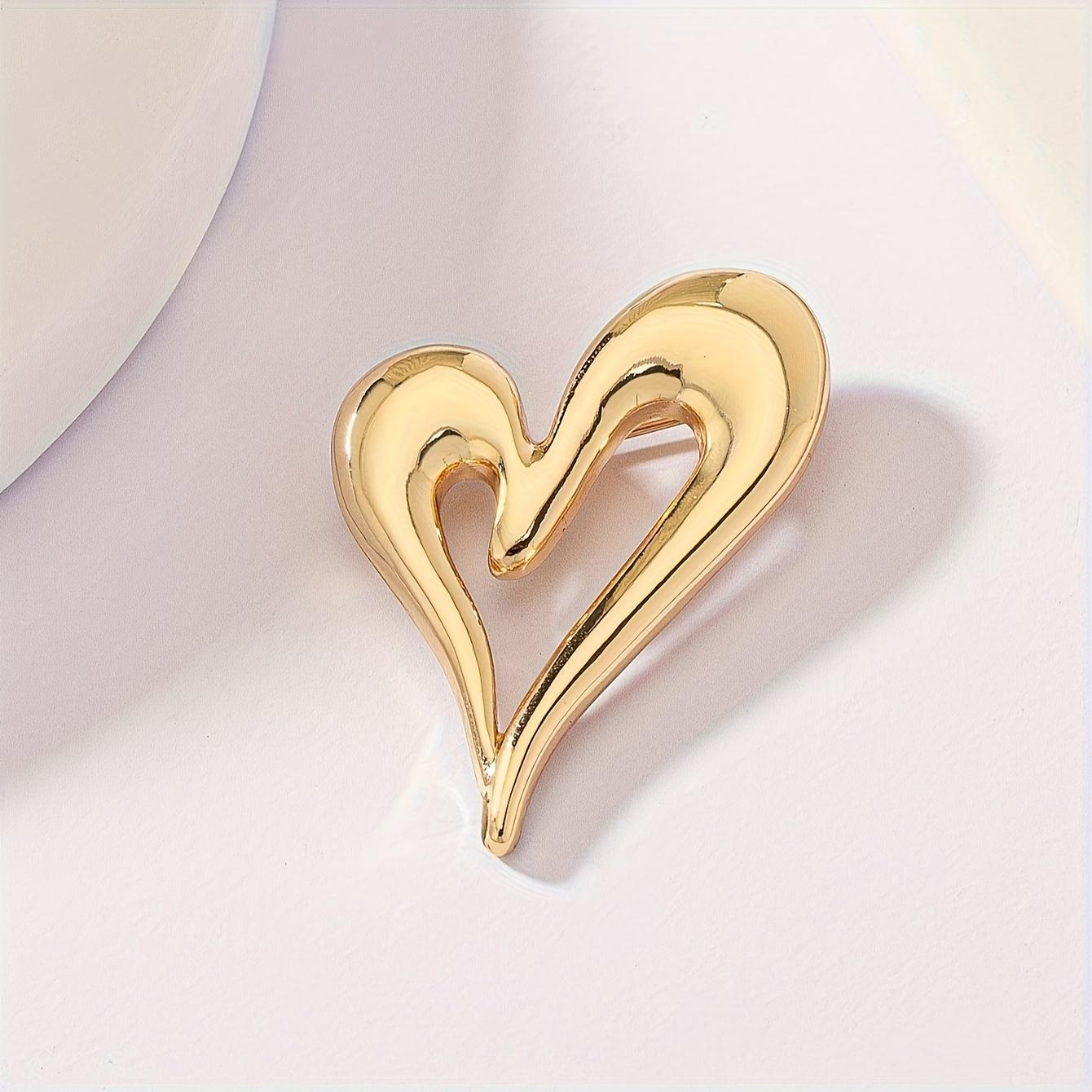 

Шикарная брошь-булавка с полым сердцем в винтажном стиле - Цинковый сплав, Идеально подходит для повседневной одежды и в качестве подарка золотистый