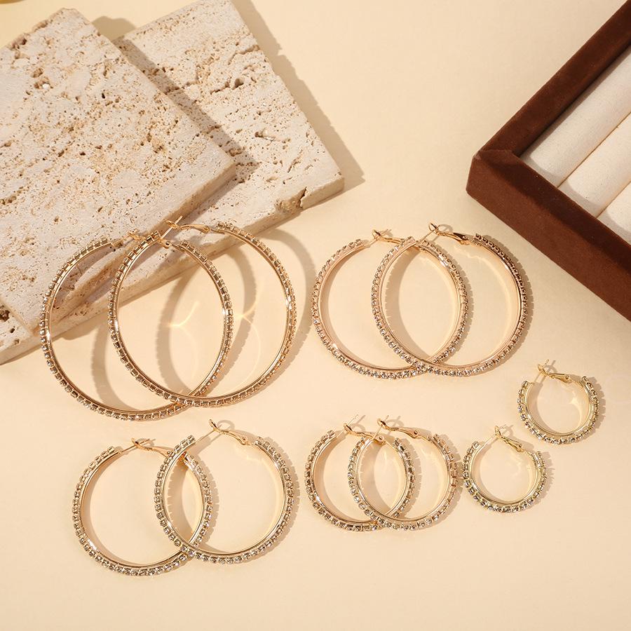 

Korean Cold Style Luxury Diamond C-Shaped Earrings – Trendy and Elegant Design