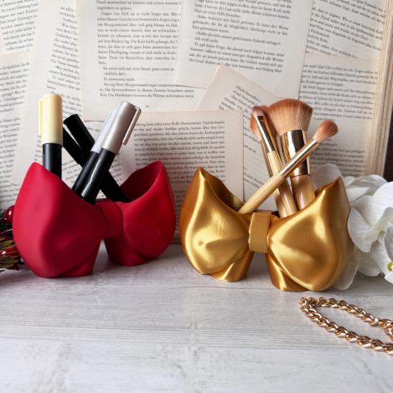 Niedlicher Schleifen-Zahnbürstenhalter Make-up-Pinsel-Organizer Schleifenförmiger Pinselständer Kamm Stiftehalter für Badezimmer Waschtisch Arbeitsplatte