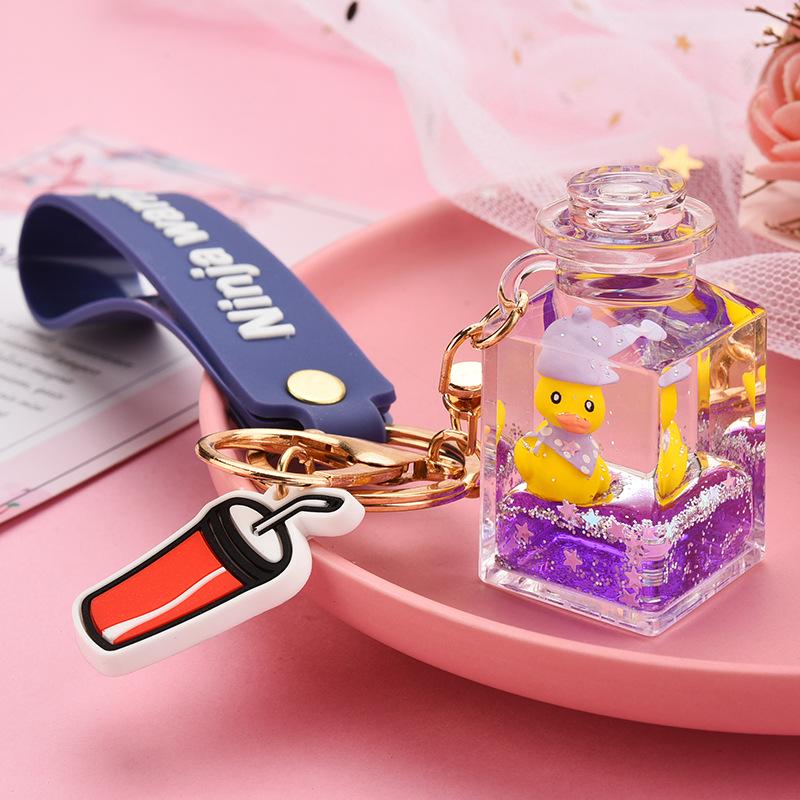 Creative Quicksand Little Yellow Duck Dinosaur Perfume Bottle Backpack Pendant Acrylic Accessory