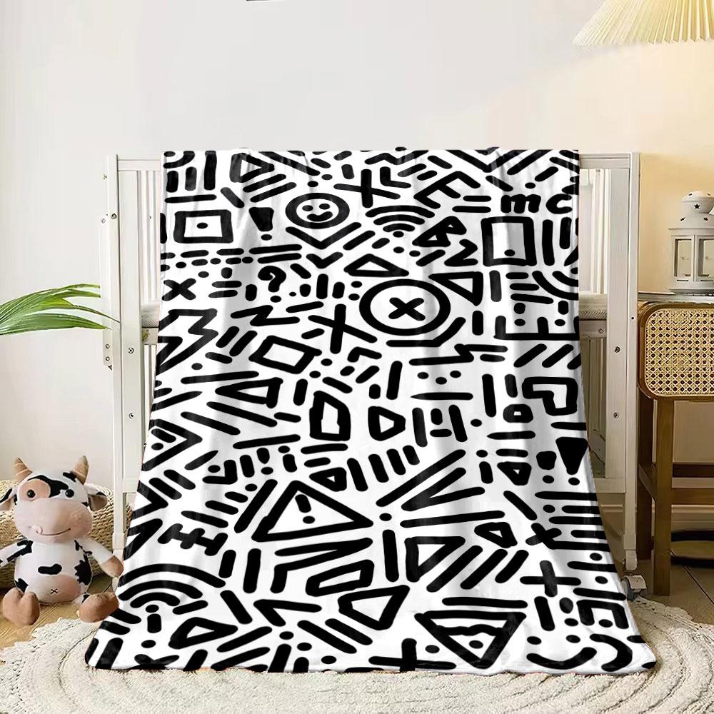 

A dense black-and-white pattern of geometric shapes, lines, and symbols. for all seasons blanket lunch break throw gift 80cm x 120cm