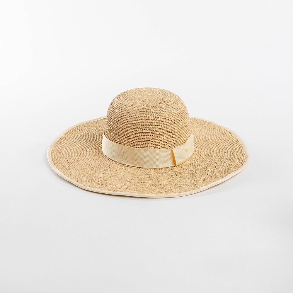 Spring and summer fashion casual hemming webbing hand-woven thin raffia big eaves hat women's sunscreen sunshade foldable straw hat