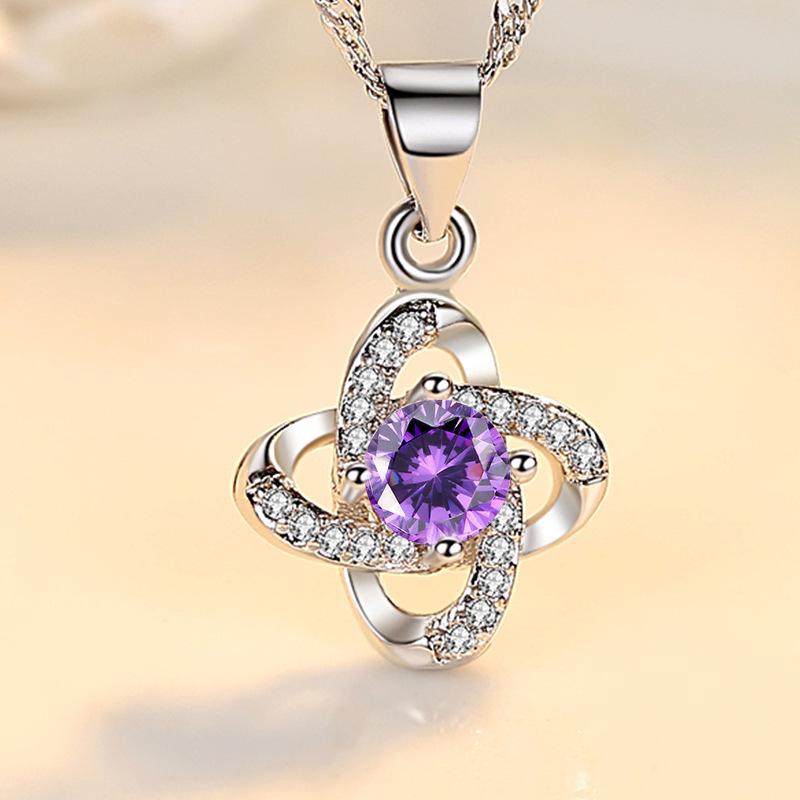 Four-Leaf Clover Pendant Korean Style Fashion Necklace with Rotating Love Design
