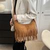 Vintage-inspired Canvas Tote Bag With Tassels And Spacious Interior For Daily Use