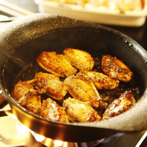 Sori Yanagi: A simple yet practical Nambu ironware shallow pot with a steel lid and handle, made in Japan. Induction compatible.