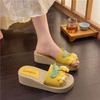 Thick-soled one-word beach shoes for travel wear 2025 summer new comfortable, lightweight and heightening holiday flower slippers