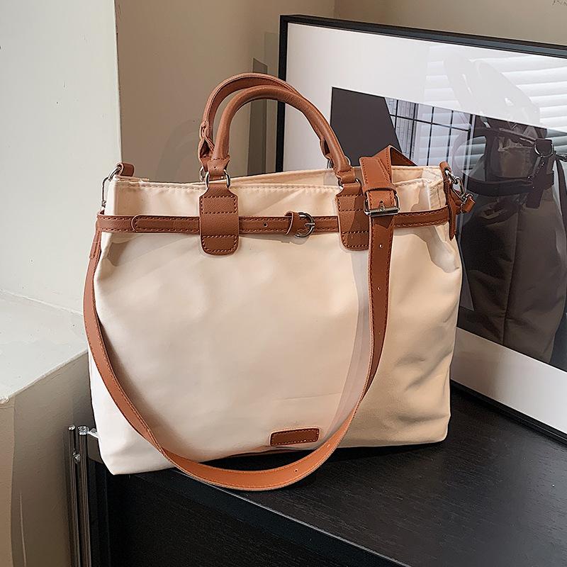 

Large-capacity bag women s autumn and winter versatile 2024 new simple women s Oxford cloth texture portable travel bag