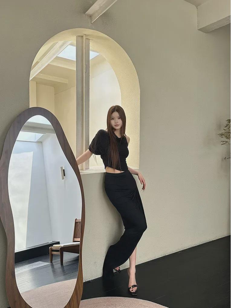 SUBHUMAN Women's European & American Style | Orange Irregular Pleated High Collar One-Shoulder Knit Top