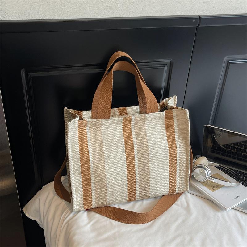 Korean version of canvas shoulder bag 2025 autumn and winter new literary stripes large-capacity student tote bag fashion shopping bag