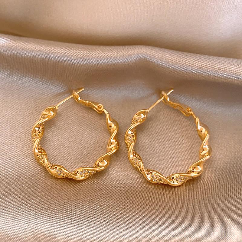

Zircon twisted earrings simple light luxury design earrings fashion personality temperament earrings