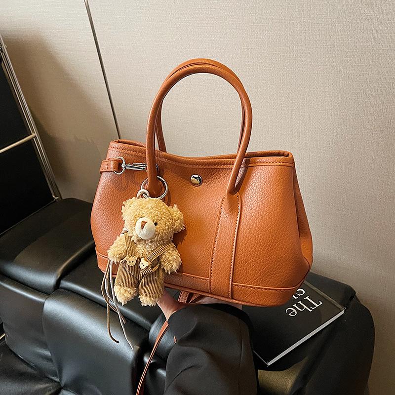 Casual hand bucket bag women's 2025 new fashion versatile shoulder bag high-end messenger women's bag