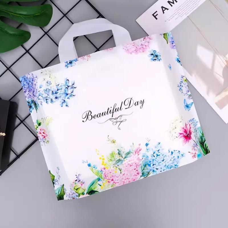 50pcs New models Handbag thick 0.14mm durable clothing cosmetic gift Shopping bags Resilient Powerful handheld Portable Packaging bag