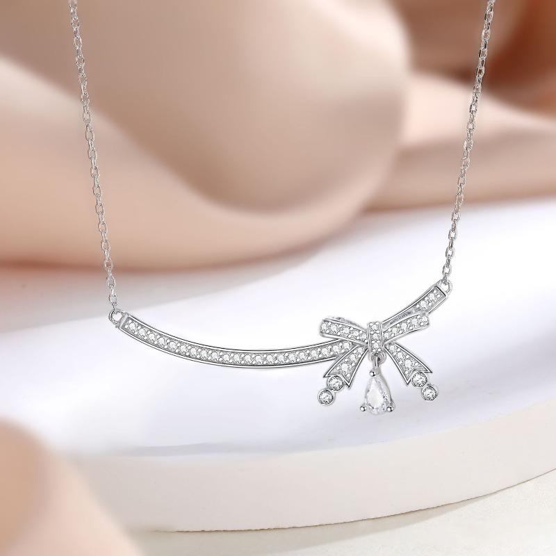 Sterling silver personalized bow necklace, women's high sense, European and American fashion big brands, the same water drop S925 silver pendant