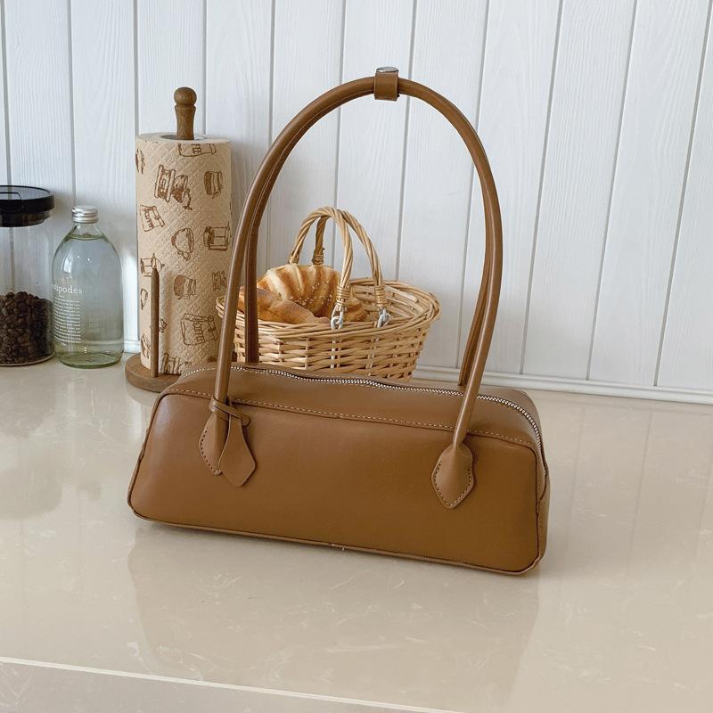 

Сумка премиум-класса в иностранном стиле, женская, большой вместимости, новинка лета 2025, нишевая, корейская версия, сумка-багет на одно плечо/подмышку коричневый