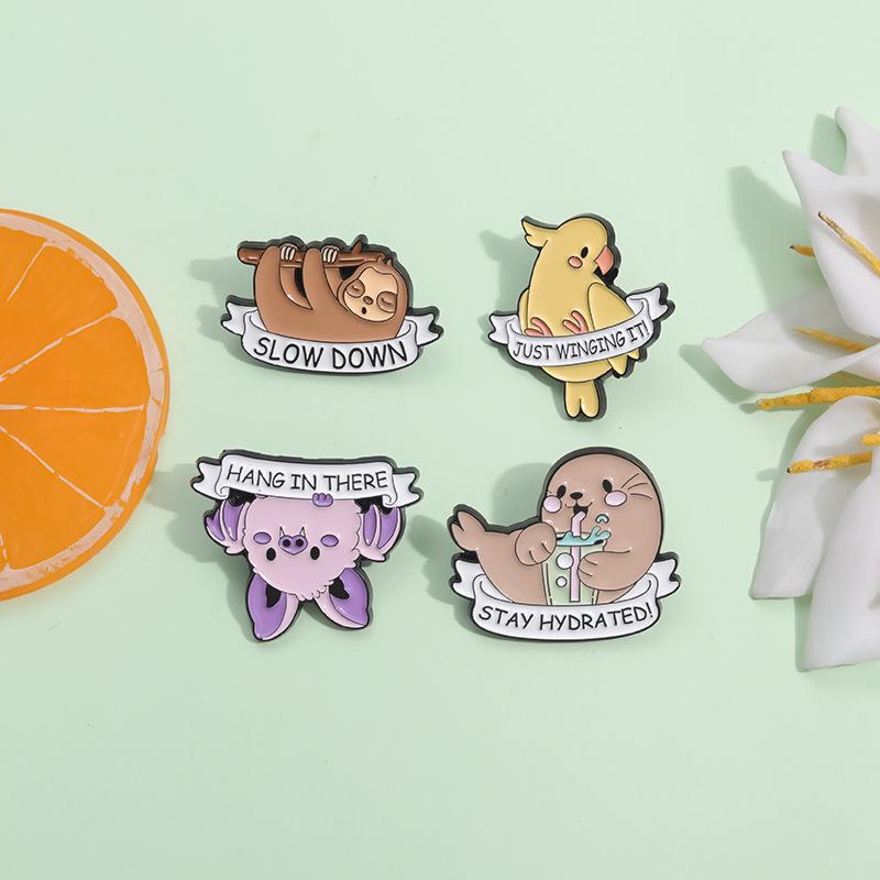 Set Broșe Adorabile Corbul Desen Animat și Puiul de Focă