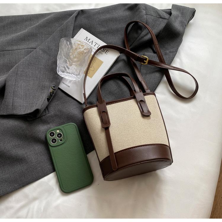 1 szt. 2025 Wybuchowa kontrastowa torba typu wiadro damska uniwersalna torba na ramię do pracy w mieście prosta torba premium wiatrówka