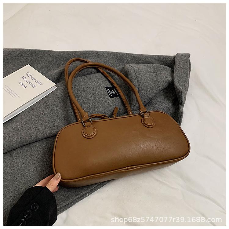 

This year s popular Boston bag women s large capacity 2025 new autumn and winter retro versatile one-shoulder commuter pillow bag кавовий