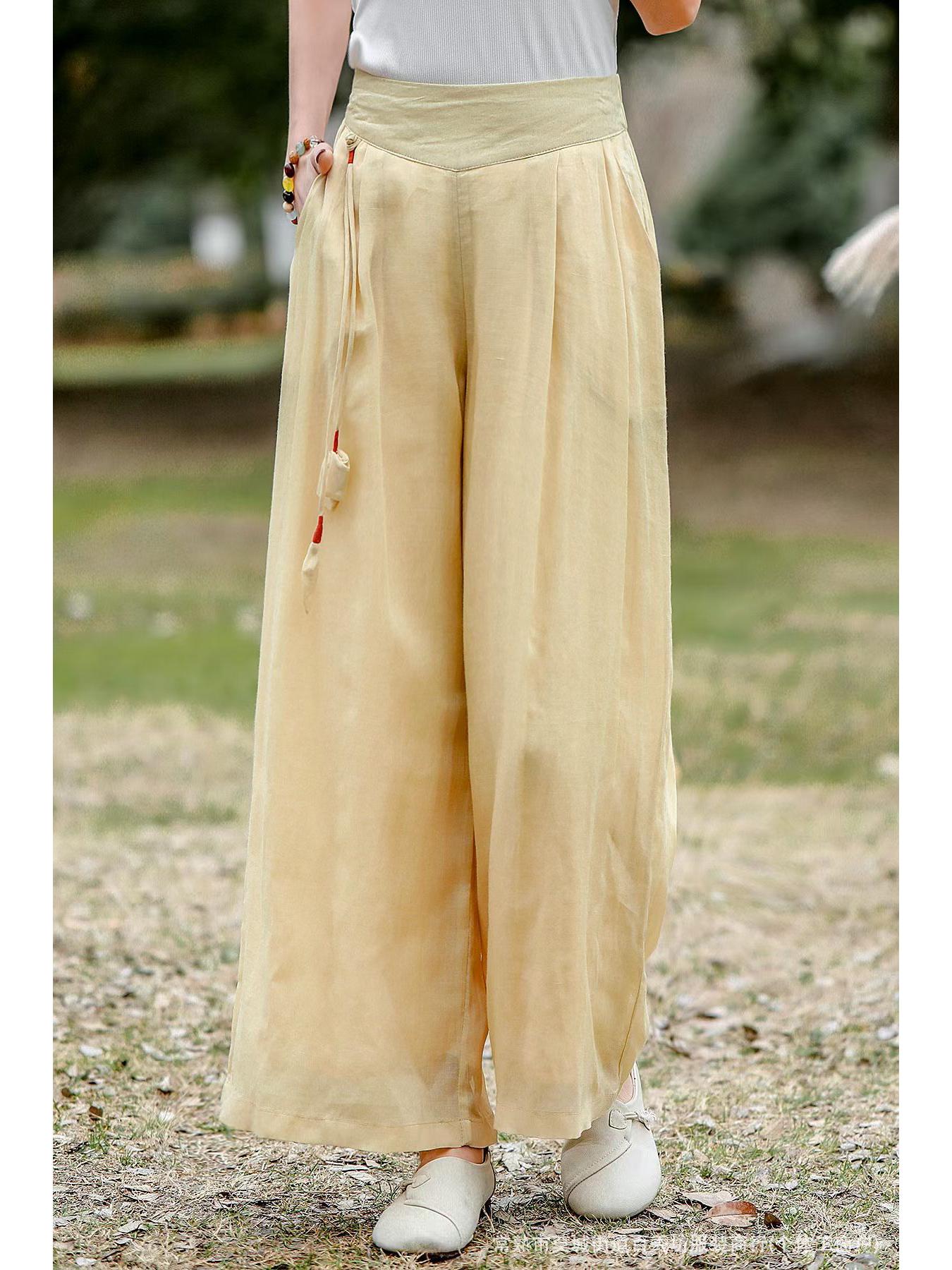 

2026 New Summer Women s Wide-Leg Ramie Pants: Artistic Solid Color, Double Layer, Elastic Waist, Tassel Details, Slimming Fit. Medium