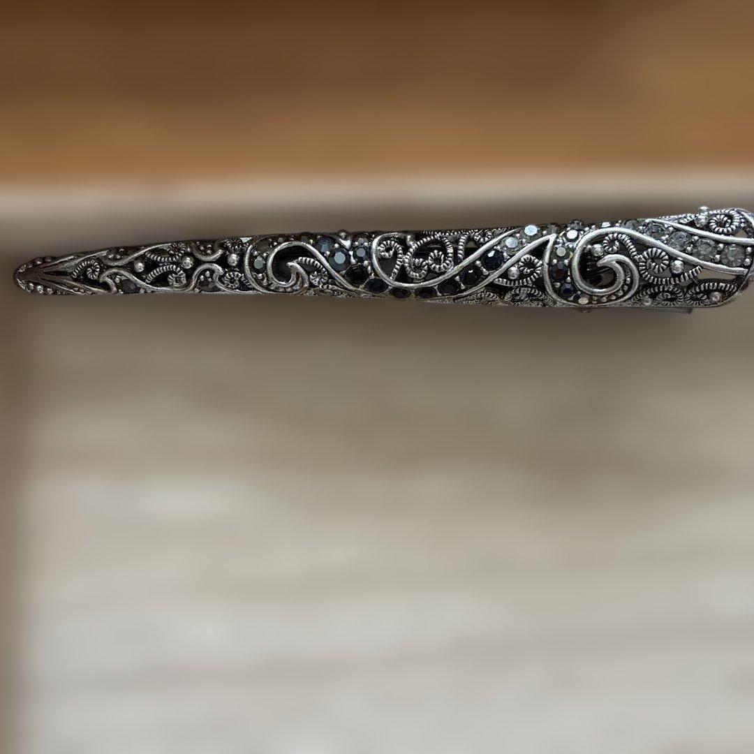 Used Antique hair clip silver color