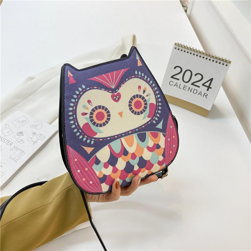 

Bags cute small bag summer 2025 new Japanese soft girl cartoon owl shape shoulder small round bag pu рожевий