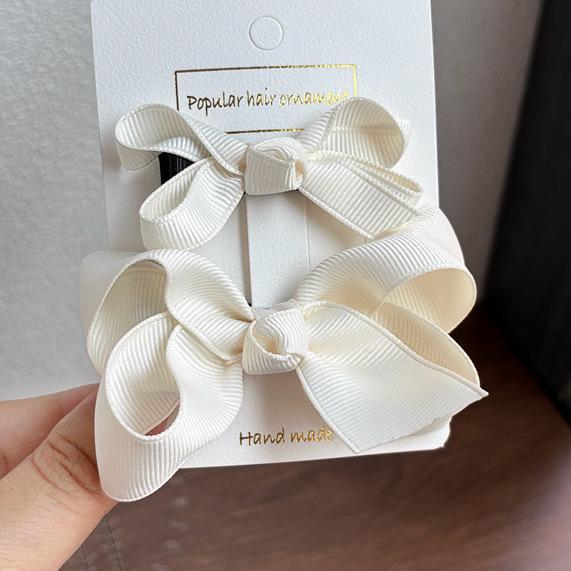 

Girls Multi-Color Flower Bow Hair Clip Set with Ribbed Band