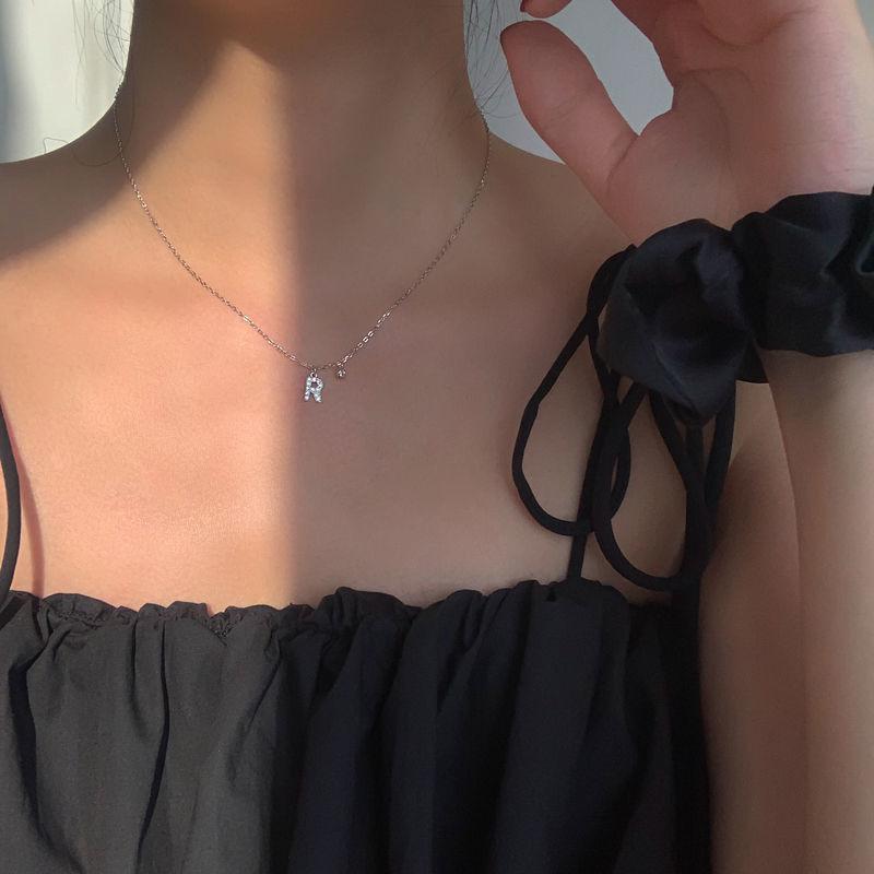 Geometric Pendant Necklace With Large And Small Squares