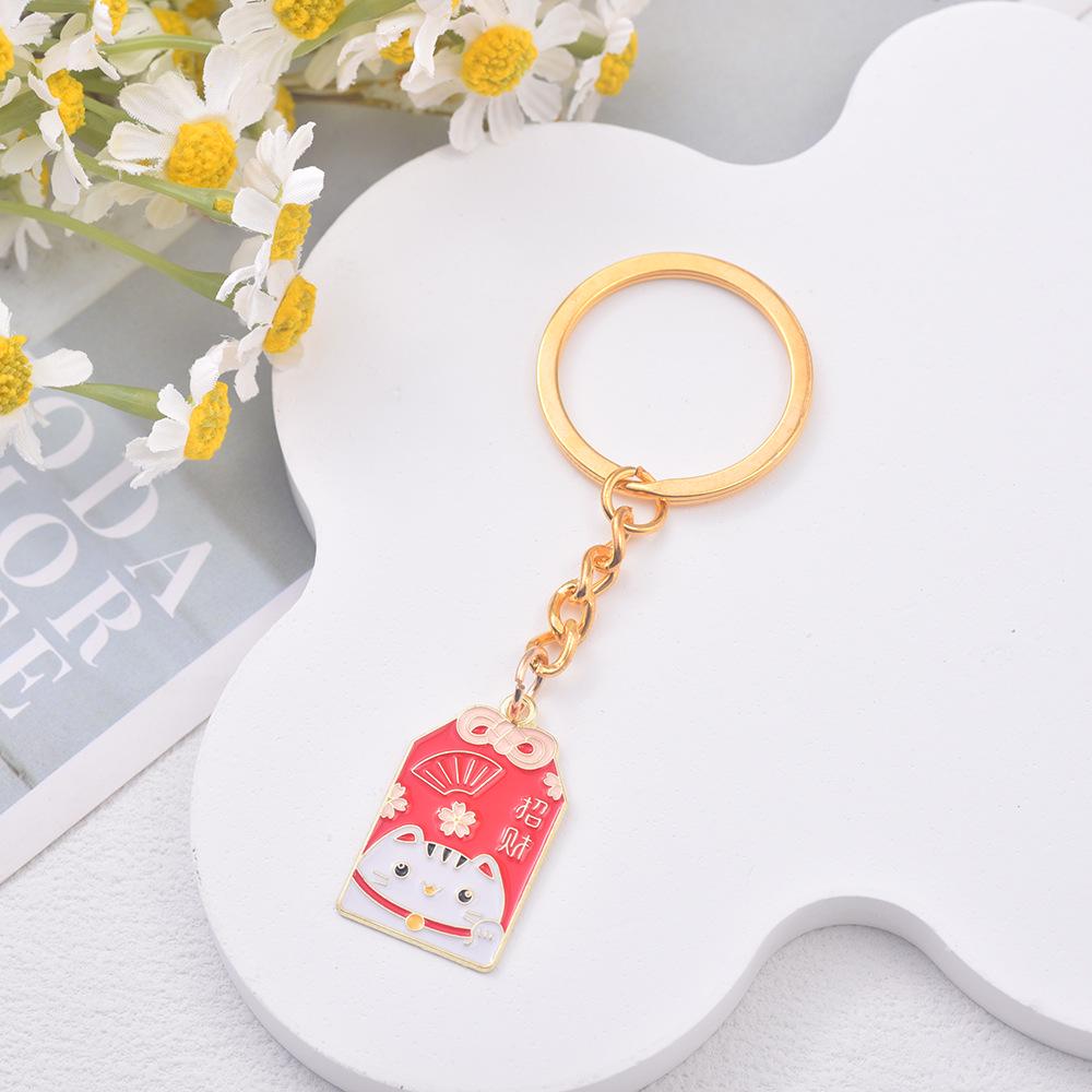 Japanese Sakura Koi Omamori Amulet Keychain for Luck, Wealth & Safety - Charming Couple's Accessory