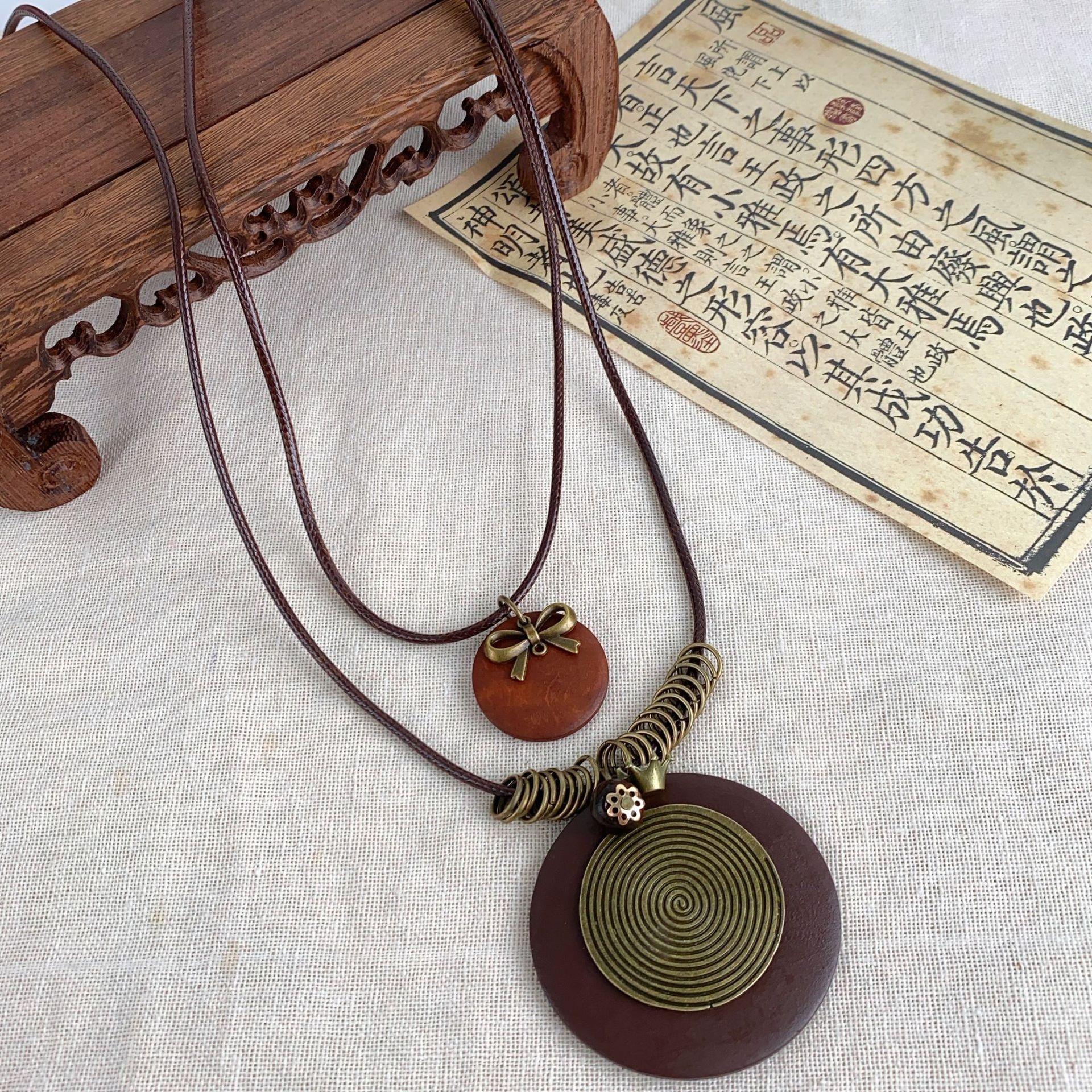 Wenyi Fan retro wooden necklace long ethnic style sweater chain Mori women Korean version versatile button pendant accessories