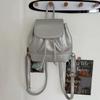 Kleine Mode-Rucksäcke Schultaschen für College-Mädchen Pu-Leder Damen-Umhängetasche Niedrige Klappe Kordel Damen-Handtaschen Tote-Tasche