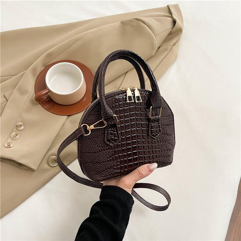 

Сумка женская 2025 летняя новая модная сумка через плечо с крокодиловым узором, нишевый дизайн, портативная сумка-ракушка в стиле ретро кофейный