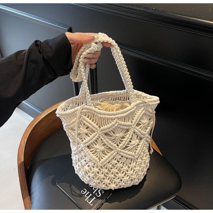 Simple Cotton Thread Shoulder Woven Bag New Summer Niche Hollow Straw Bag Portable Women's Bag Vacation Beach Bag