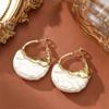 Retro and Simple Imitation Pearl Creative Earrings, Fashionable and Niche in Style, Geometric and High-end Ear Ornaments for Women.