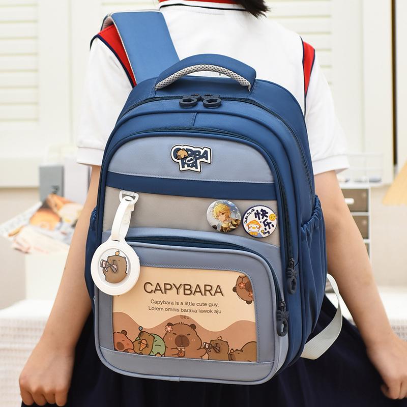 Children's school bag, new cartoon backpack, primary school bag, large-capacity load-reducing ridge backpack, cross
