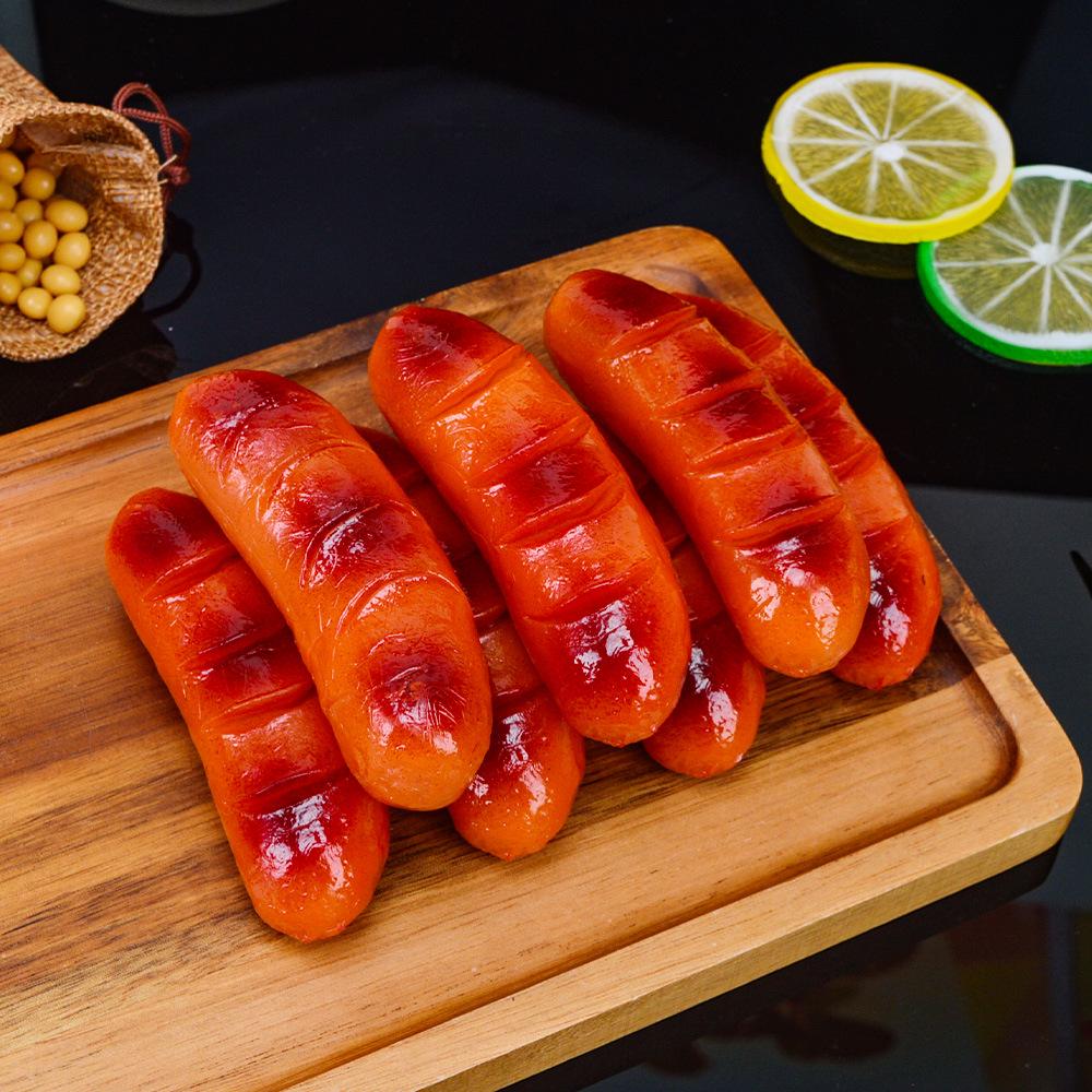 Simulated Roast Sausage and Ham Hot Dog Food Props for Photography and Play.