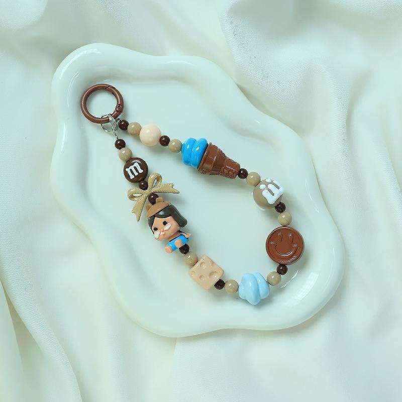 Roztomilá kreslená panenka s korálkovým popruhem na telefon, řetízkem na batoh, přívěskem na klíče, přívěskem proti ztracenému telefonu, dárkem pro iPhone, Samsung a dívku