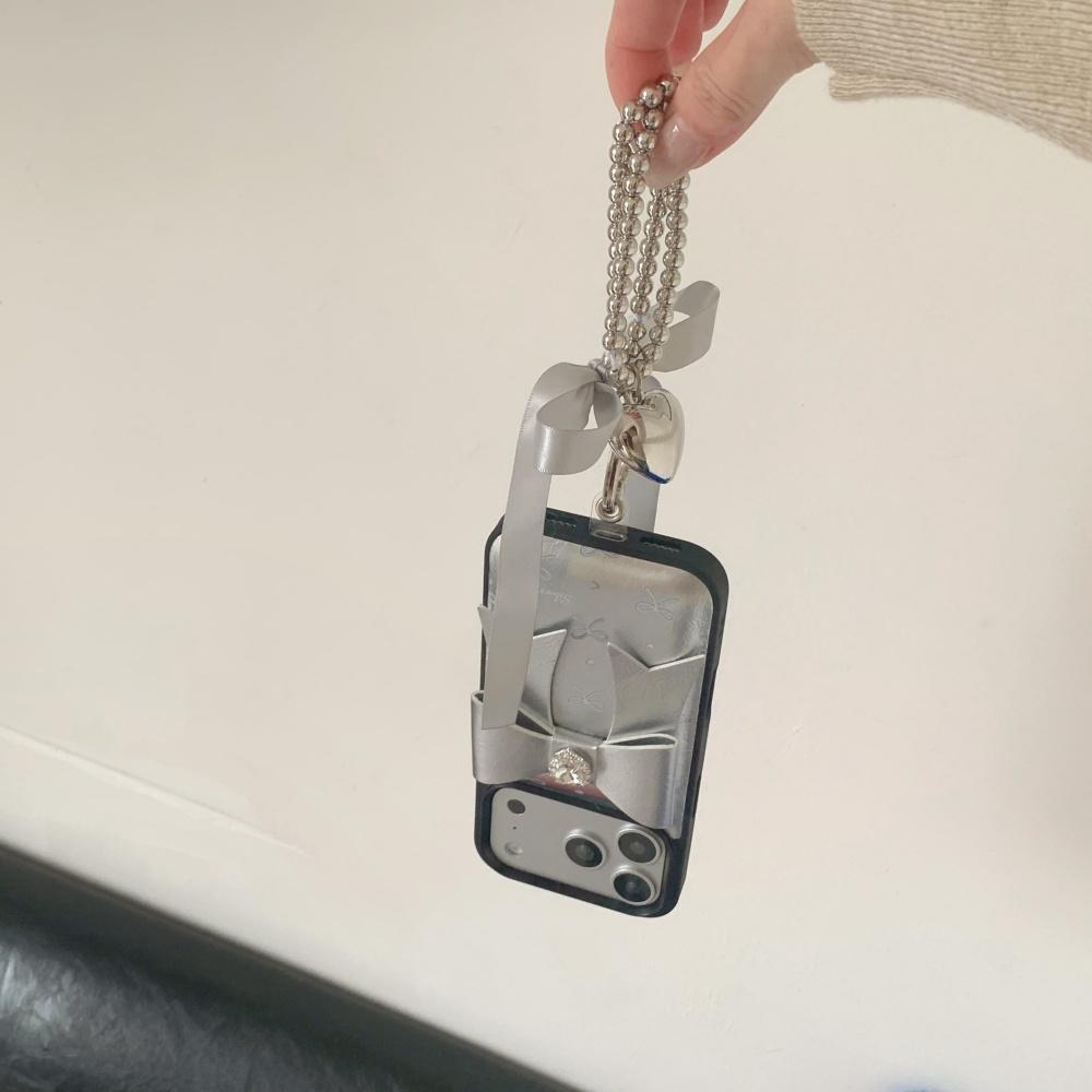 Korean ins silver leather three-dimensional bow, suitable for Apple 17 mobile phone case, new iPhone17promax high value 15 trend 14 flash diamond 13